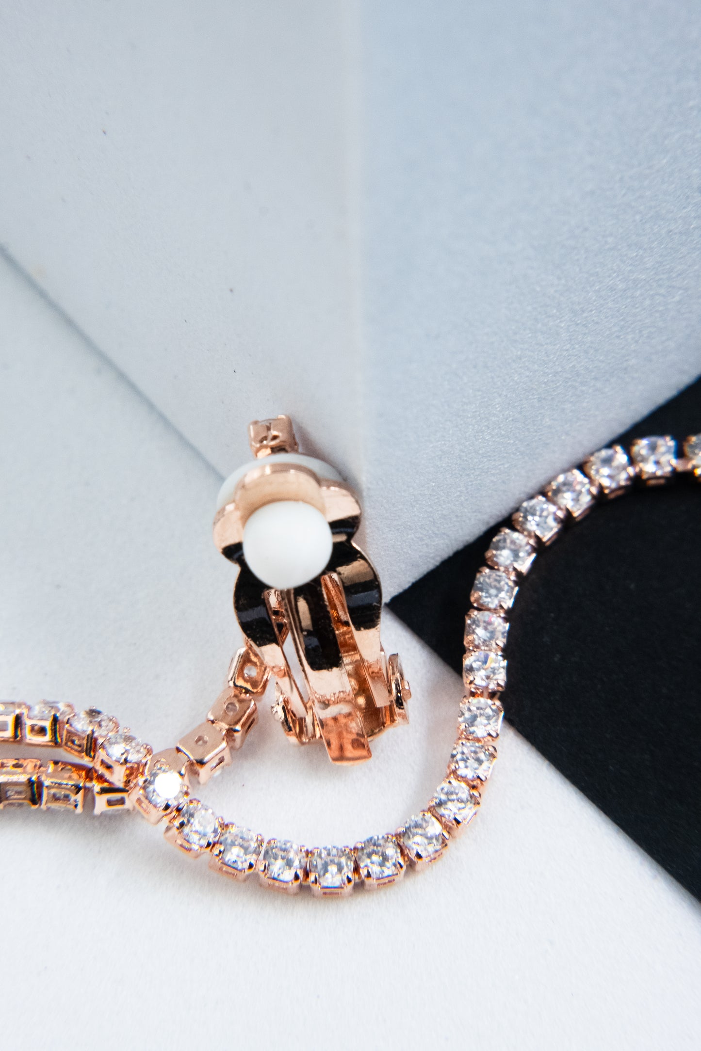 ORECCHINI CLIP 1 FILO STRASS ORO ROSA