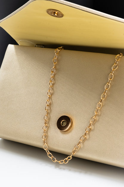POCHETTE IN ECOPELLE ORO