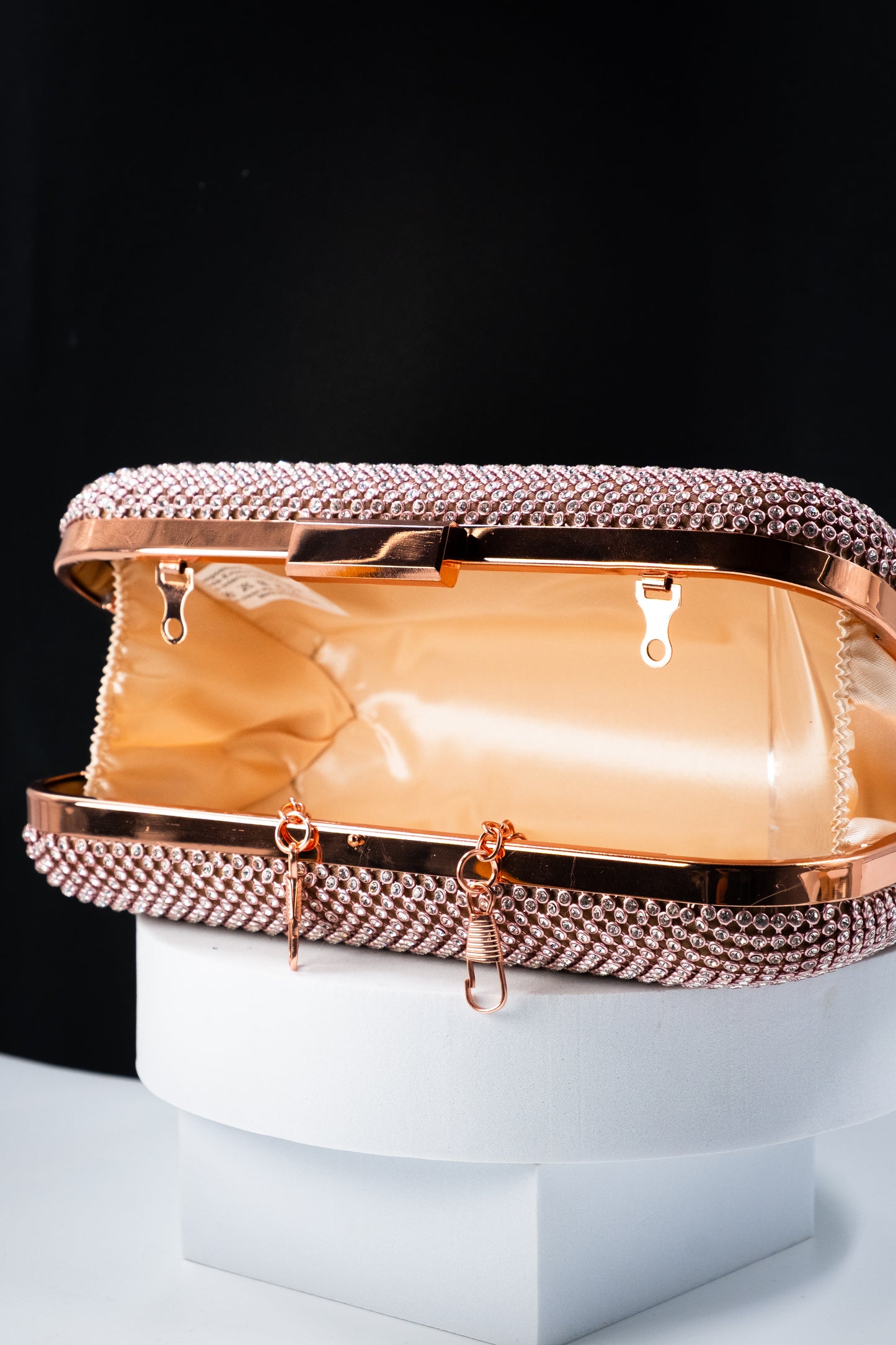 CLUTCH STRASS ORO ROSA